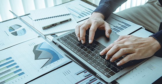 Man Typing on Computer Keyboard