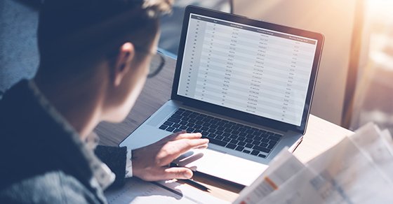 employee working off of his business laptop