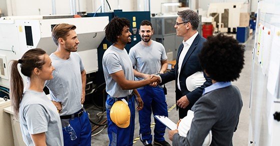 business owner talking to his staff