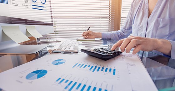 woman working on her business financial statements