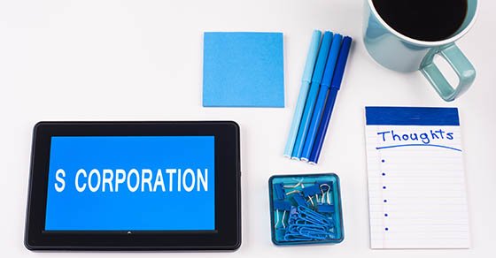 aerial view of blue colored office supplies